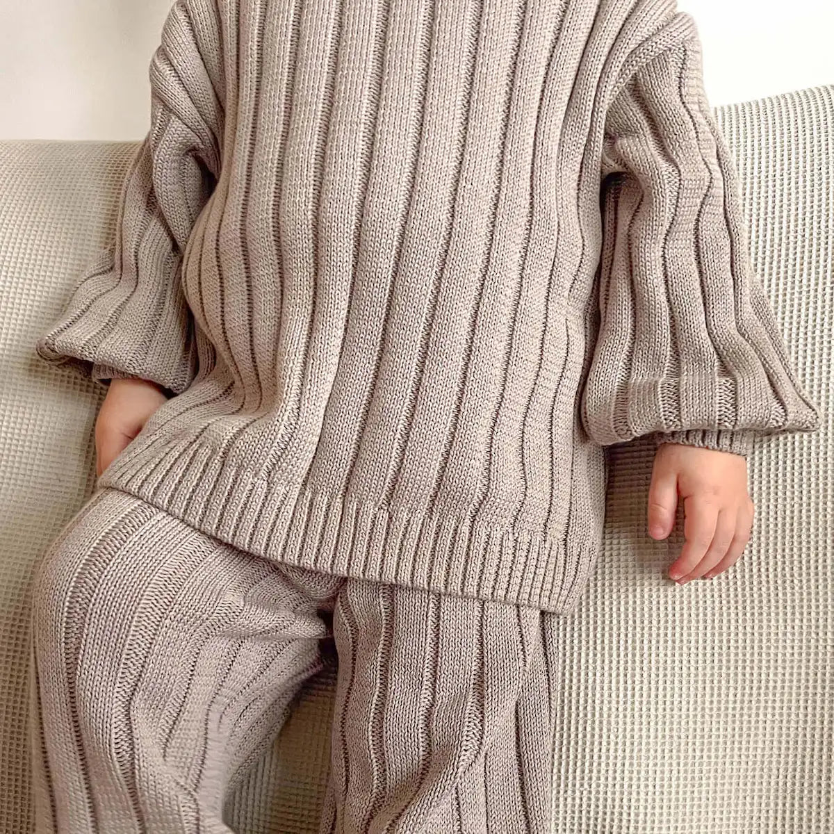 toddle wearing the wide rib knit set in tottles beige, made from 100% organic cotton, soft and snug for little ones