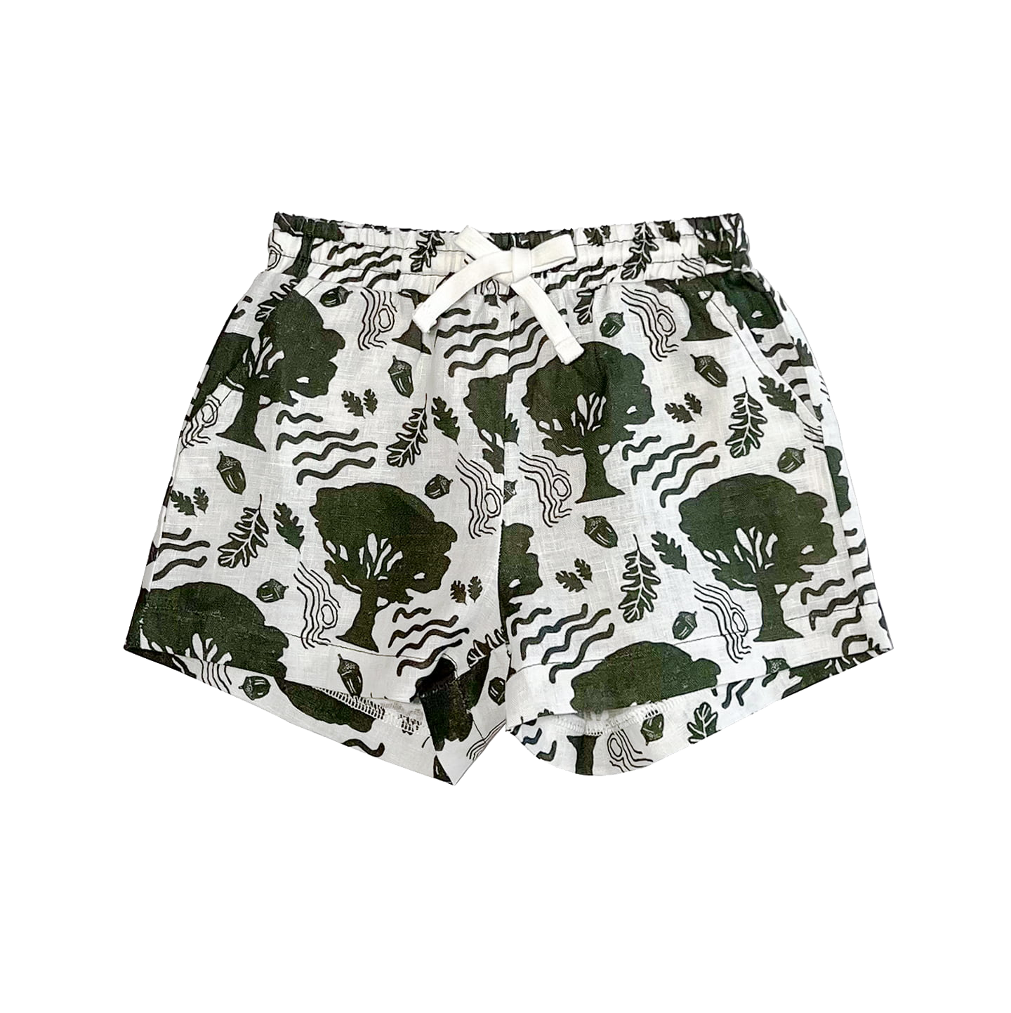Shorts with green tree pattern on a white background